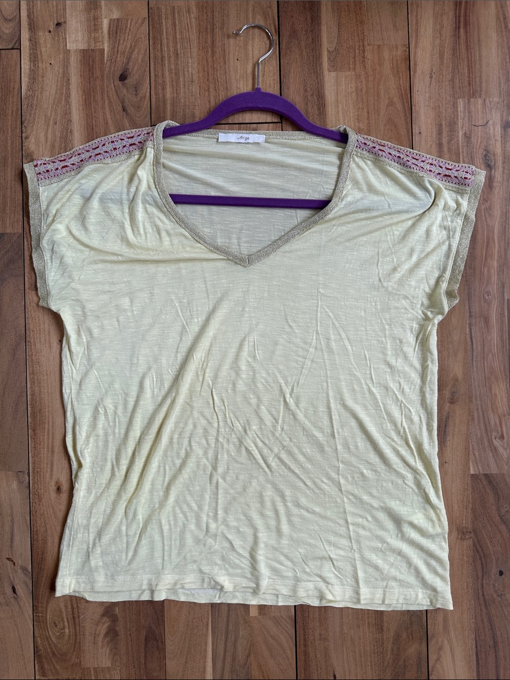 V-Neck Short Sleeve Tee with Metallic Trim Shoulders in Pale Yellow